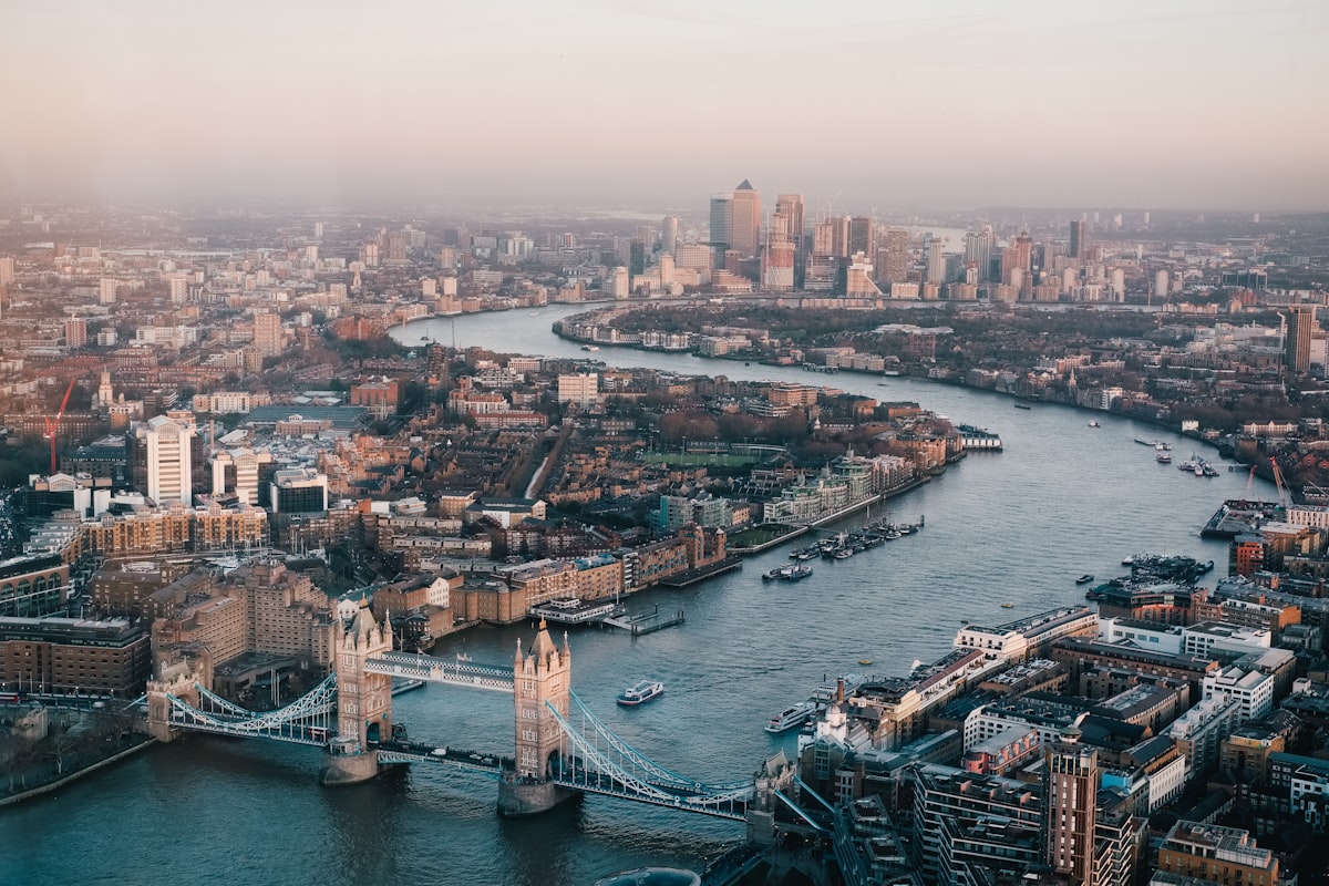 UK Graduate Route Visa - Graduate celebrating with London skyline and Big Ben